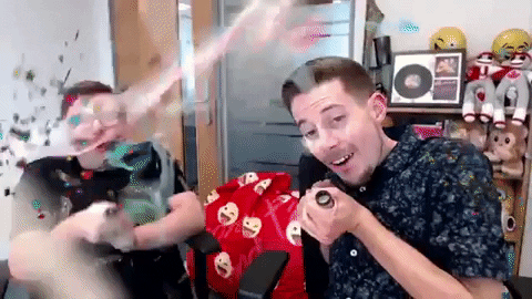 Andrew & Pete With Party Popper GIF