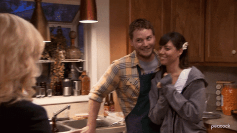 Andy Dwyer Grinning Alongside Aubrey Plaza GIF