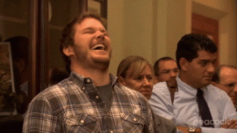 Andy Dwyer Laughing With People Around GIF