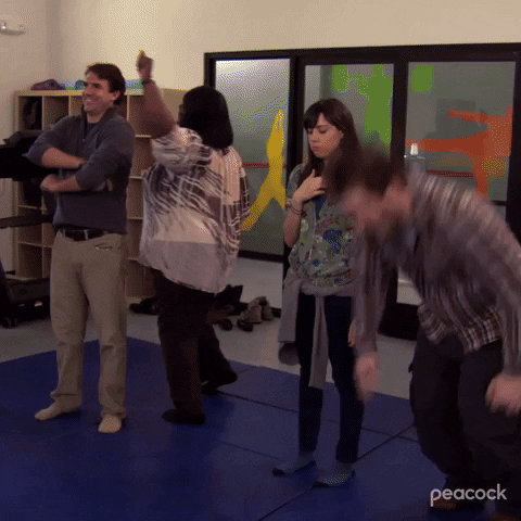 Andy Dwyer Rolling On A Floor Mat GIF