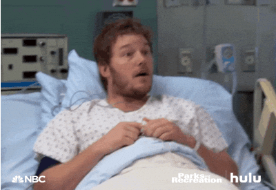 Andy Dwyer Thumbs Up In Hospital Bed GIF