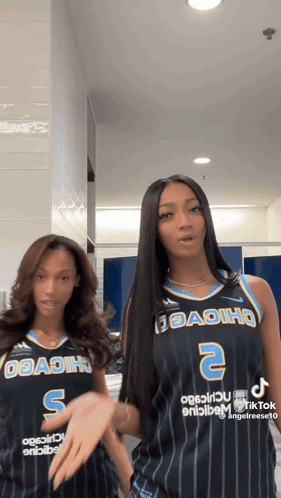 Angel Reese And Kysre Gondrezick GIF