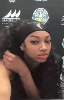 Angel Reese Covers Mouth Laughing GIF