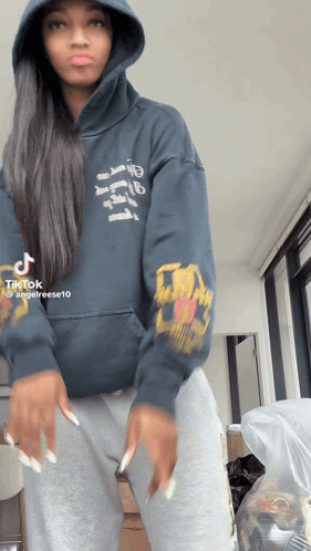 Angel Reese Dancing In Hoodie GIF
