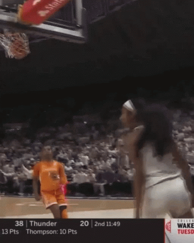 Angel Reese Touches Her Tongue GIF