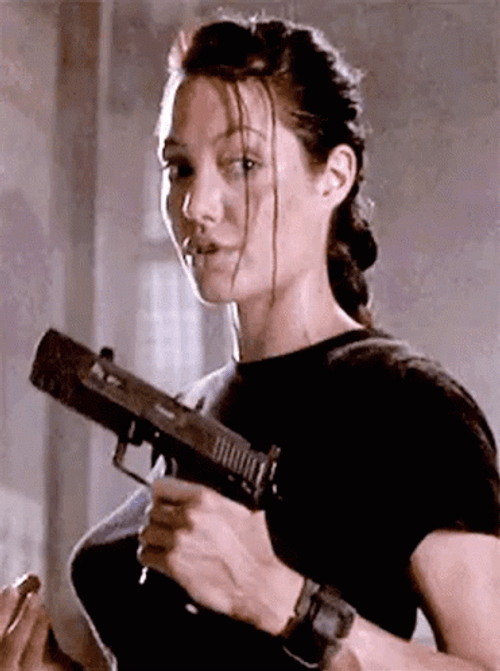 Angelina Jolie Holding A Gun GIF