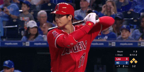 Angels Baseball Player Swinging at Ball