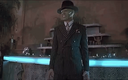 Anger State Of The Mask While Holding Guns GIF