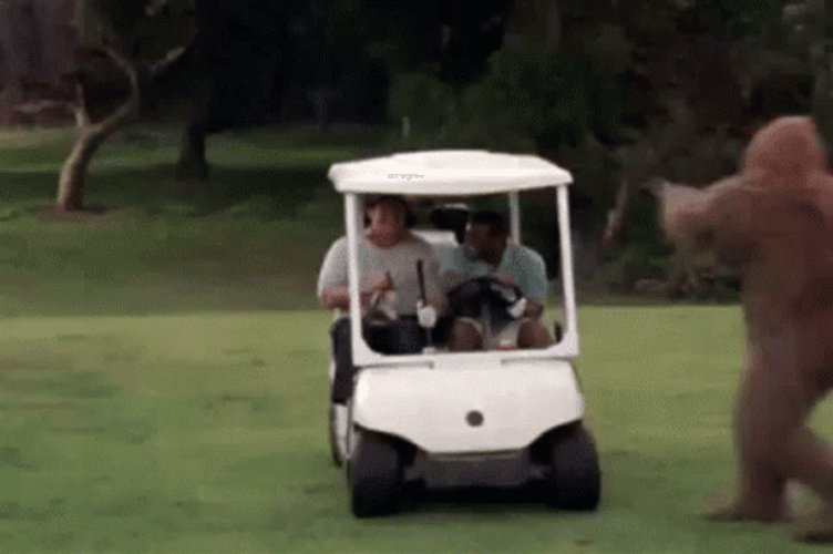 Angry Bigfoot Attacking Golf Cart GIF