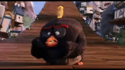 Angry Bird Standing on Wooden Platform
