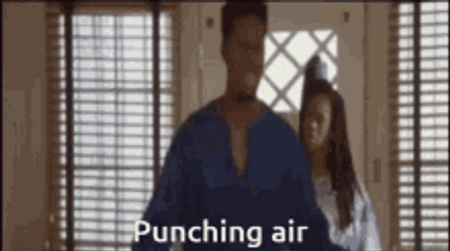 Angry Guy Punching Air GIF