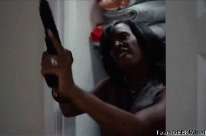 Angry Lady Loading Gun GIF