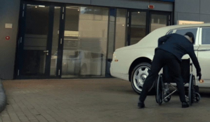 Angry Man Kicking Wheelchair GIF