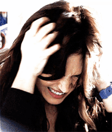 Angry Megan Fox Scratching Head GIF