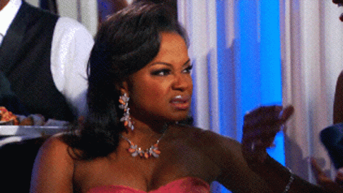 Angry Woman in Pink Dress With Earrings