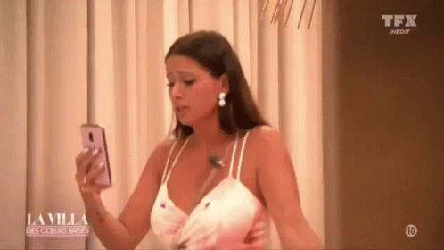 Angry Woman Throwing Phone GIF