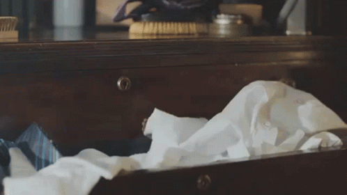 Animated Baby Meerkat Glimpsing Around GIF