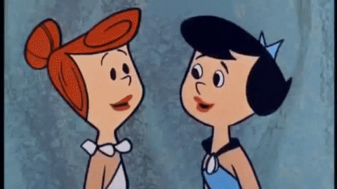 Animated Betty And Wilma Laughing The Flintstones GIF