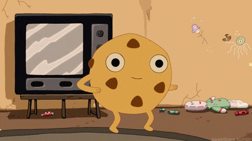 Animated Famous Amos Cookie Dancing Infront Tv GIF