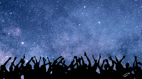 Animated Happy New Year With A Fireworks Above The Crowd GIF