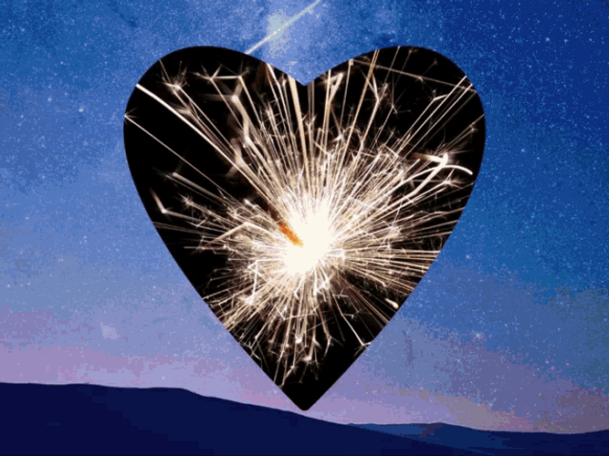Animated Heart In The Sky With Fireworks GIF