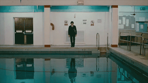Animated Man Jumping In The Pool GIF