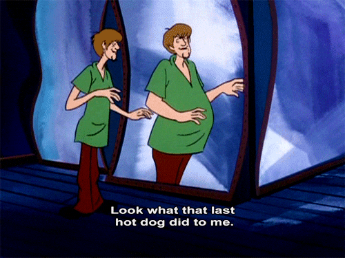 Animated Shaggy Checking Himself On The Mirror After Eating Hotdogs GIF