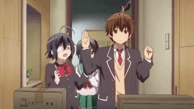 Anime Characters Standing in Room With Boxes