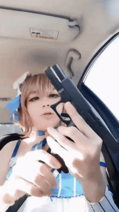 Anime Cosplayer Reloading Gun GIF
