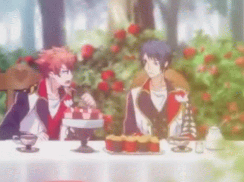 Anime Couple Sitting At Table With Cupcakes GIF