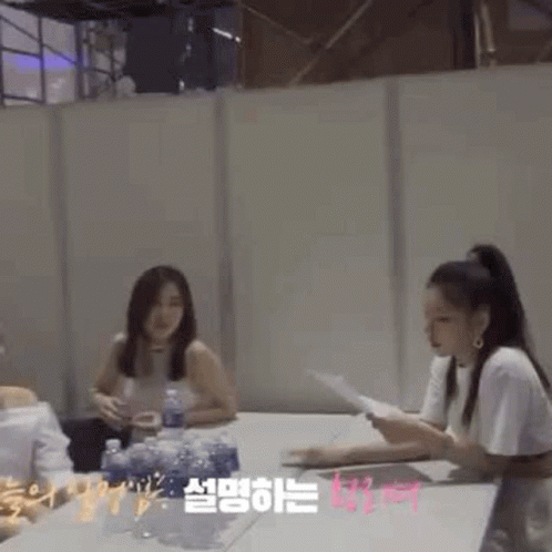 Anime Girls Sitting Around Table Talking