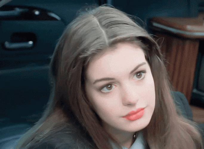 Anne Hathaway Charmingly Staring GIF