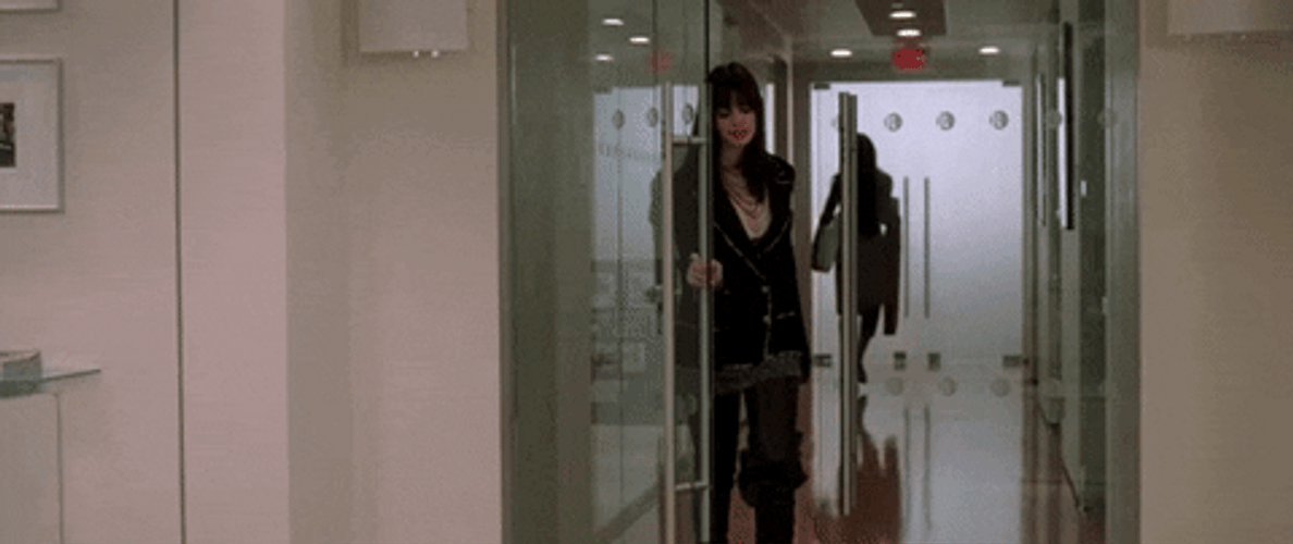 Anne Hathaway Pushing The Door GIF