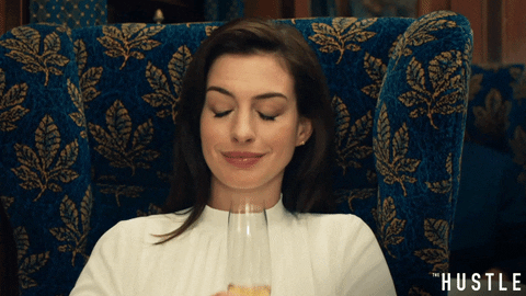 Anne Hathaway Seating While Simply Agree GIF