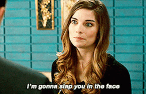 Annie Murphy Slapping Face GIF