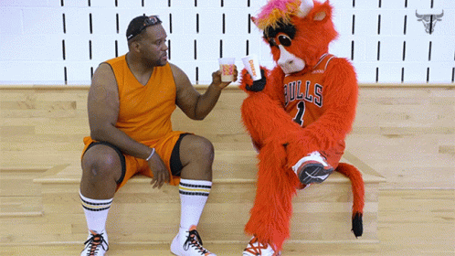 Anthony Adams Drinking With A Mascot GIF