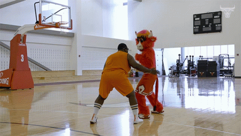 Anthony Adams Playing Basketball With Mascot GIF
