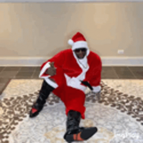 Anthony Adams Wearing Santa Claus Costume GIF