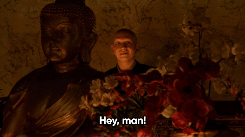 Anthony Carrigan Standing Beside Buddha Gulp GIF