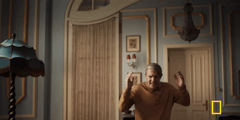 Antonio Banderas Hands Up Surrender GIF