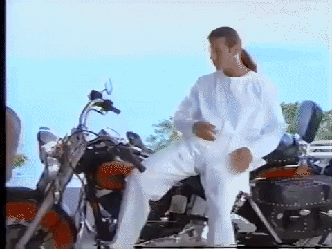 Antonio Banderas Long Haired Big Bike GIF