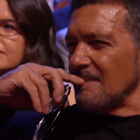 Antonio Banderas Shy Grin Clapping GIF