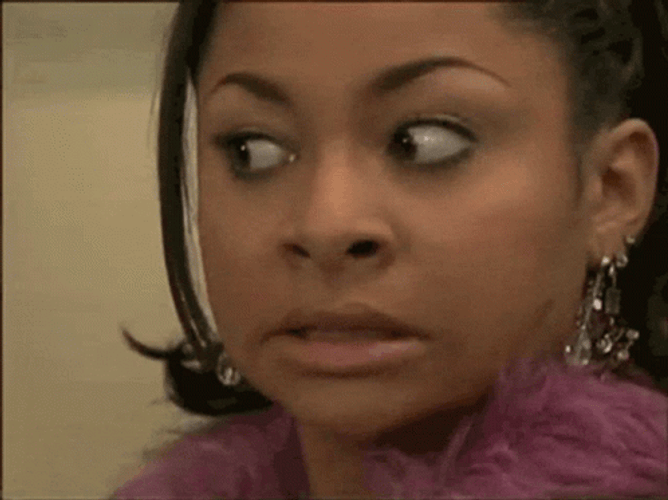Anxious Raven-symone Chewing Gum Looking Around GIF