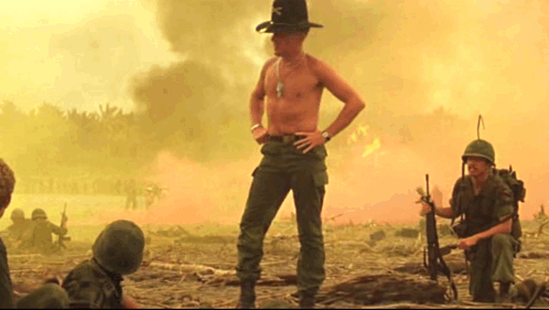 Apocalypse Now Scene Lt Col Bill Kilgore Looking Around GIF