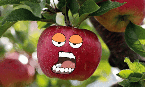 Apple With Face Hanging From Tree