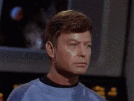 Two Men Nod Each Other As Approved GIF