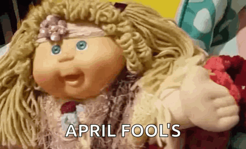 April Fools Doll Waving GIF
