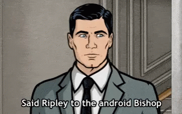 Archer Says Ripley To The Android Bishop While Wearing A Suit And Tie GIF