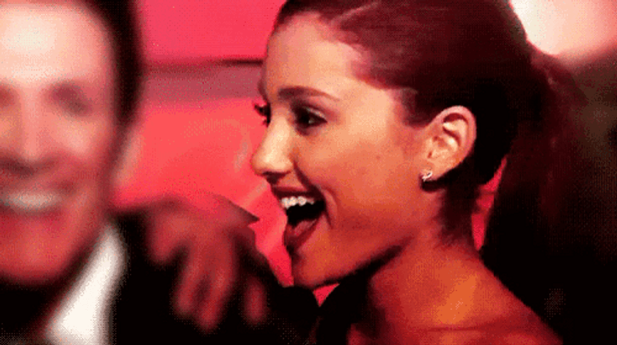 Ariana Grande Pleasantly Displaying Big Smile GIF
