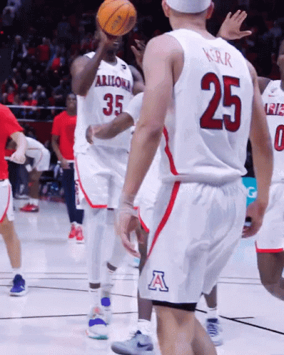 Arizona Basketball Players Number 35 And 25 Are Playing A Game GIF